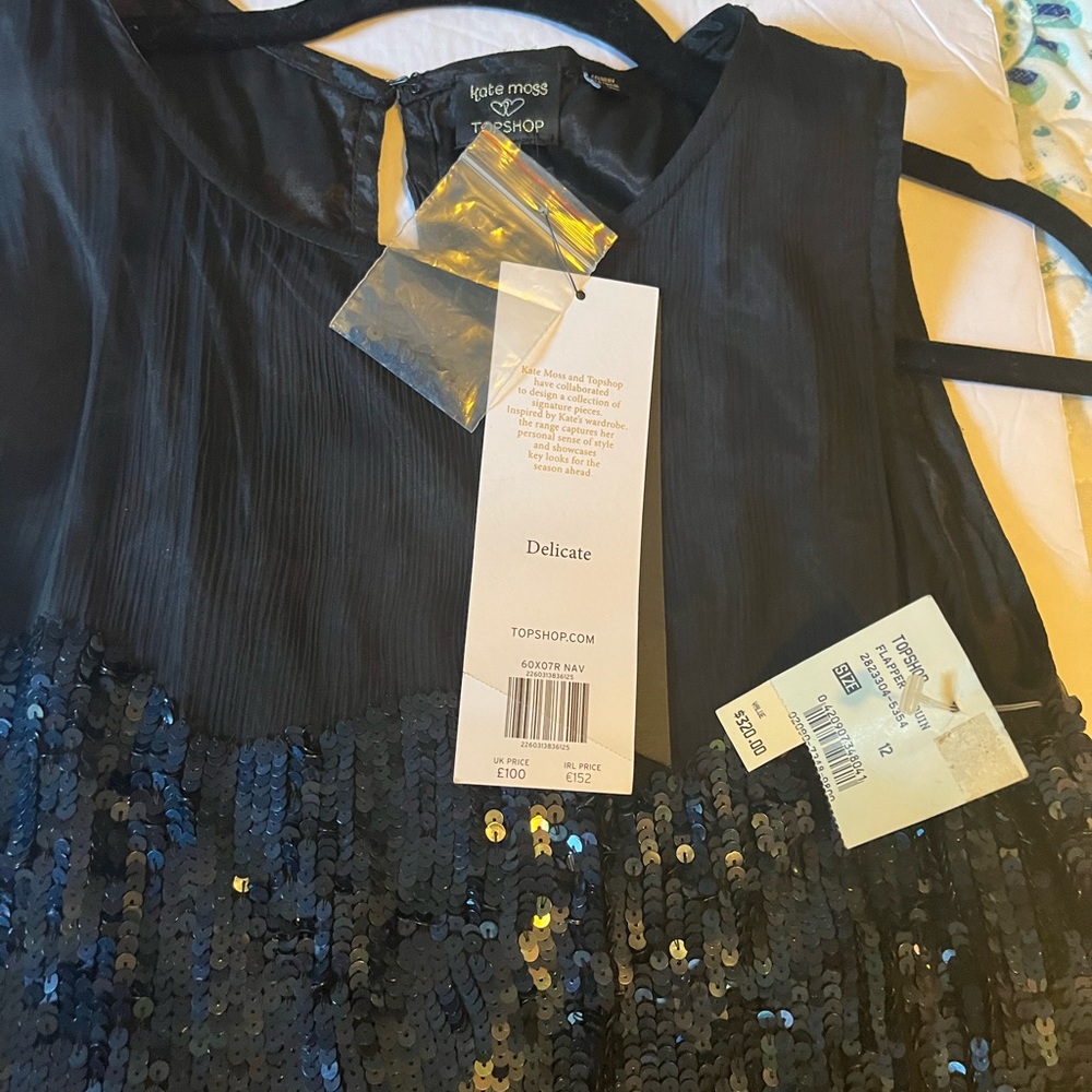 Beautiful party dress .. elegant sexy and comfortable. Size 12
